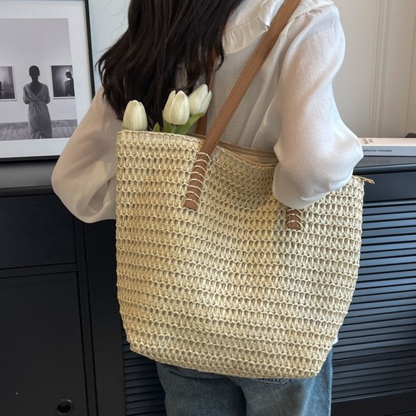 Chic straw beach bag for summer vacations and woven tote bag styles
