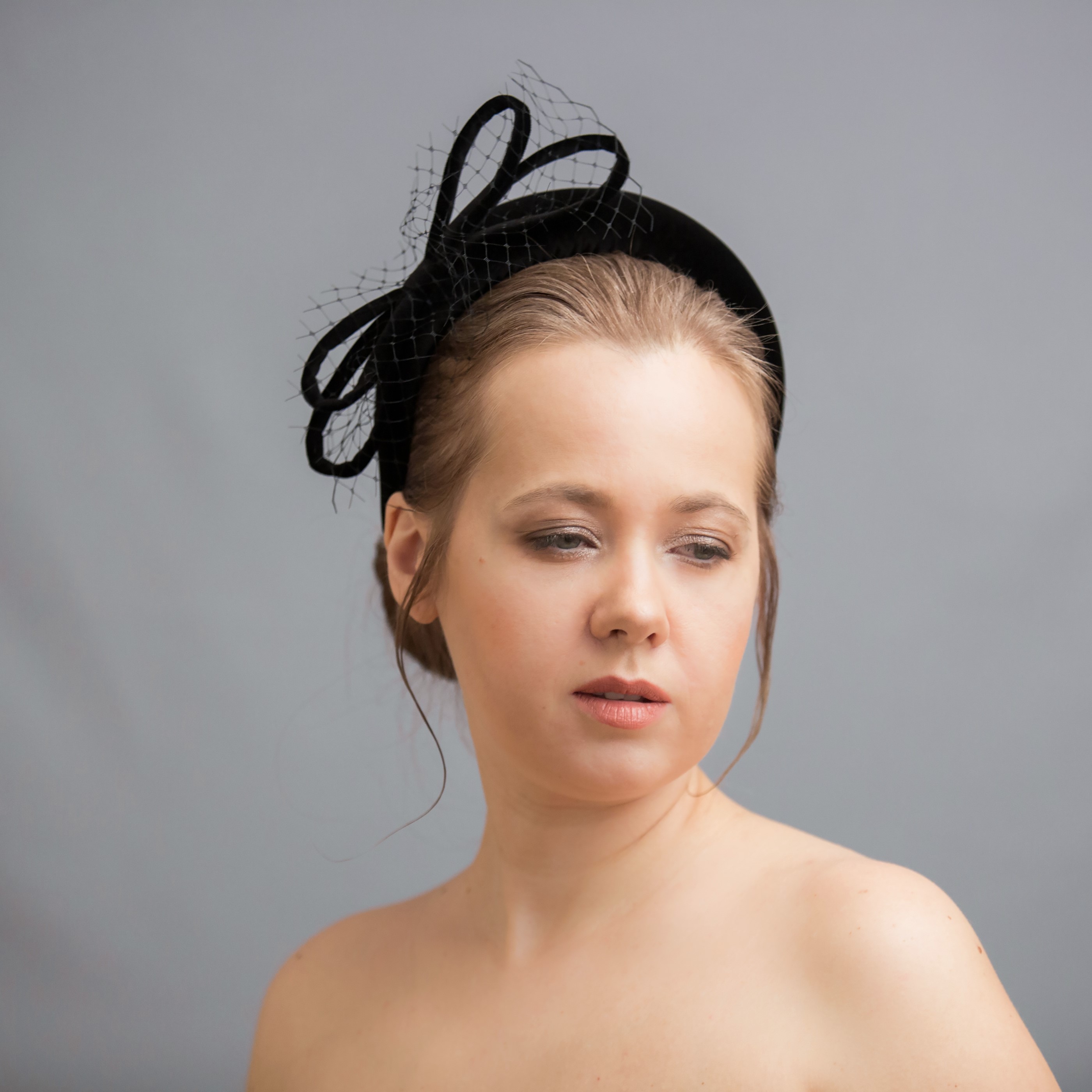 Black velvet fascinator. Padded velvet 