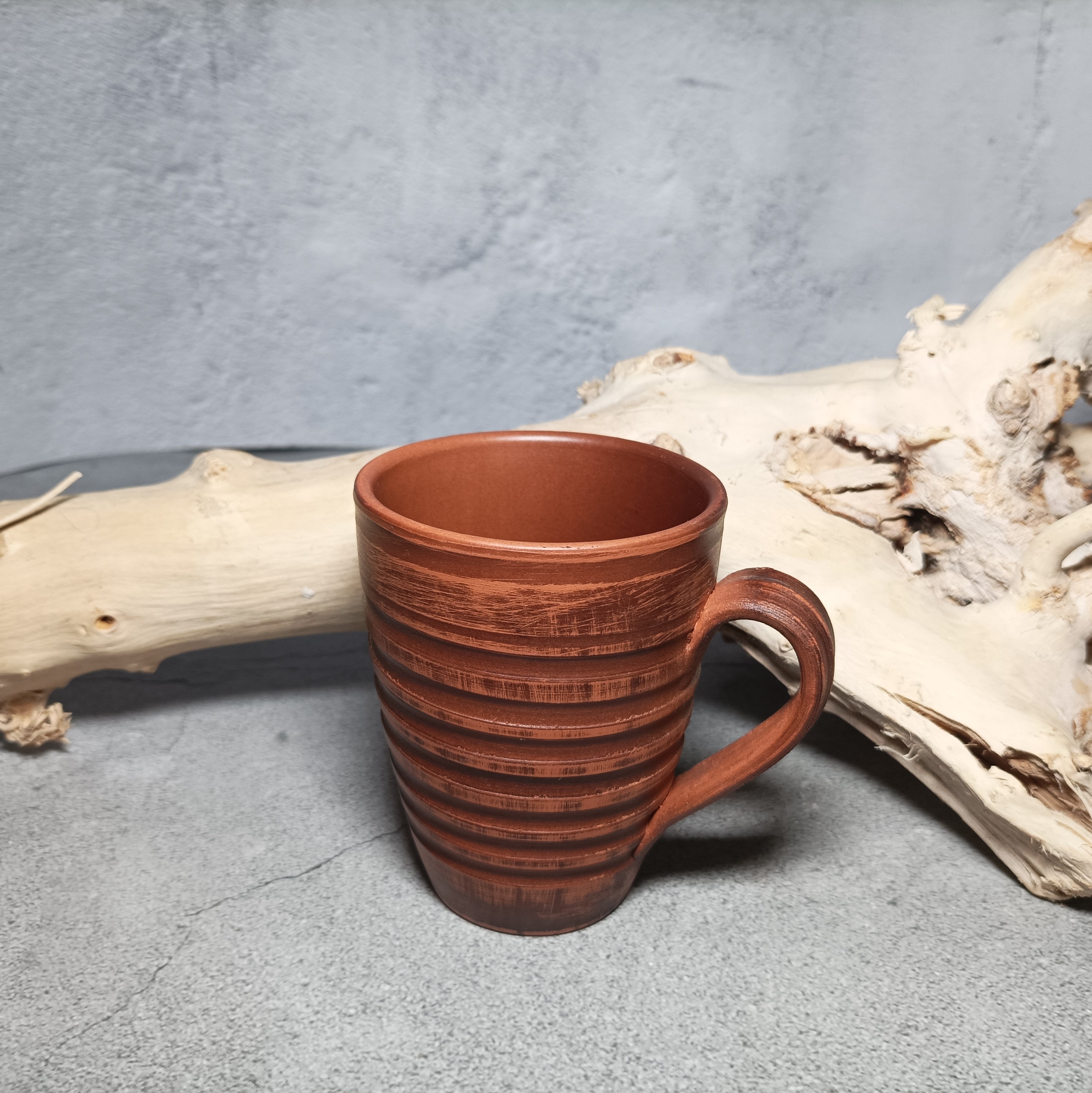 Handmade cup. Pottery handmade red clay. Cup with carved pat Inspire Uplift