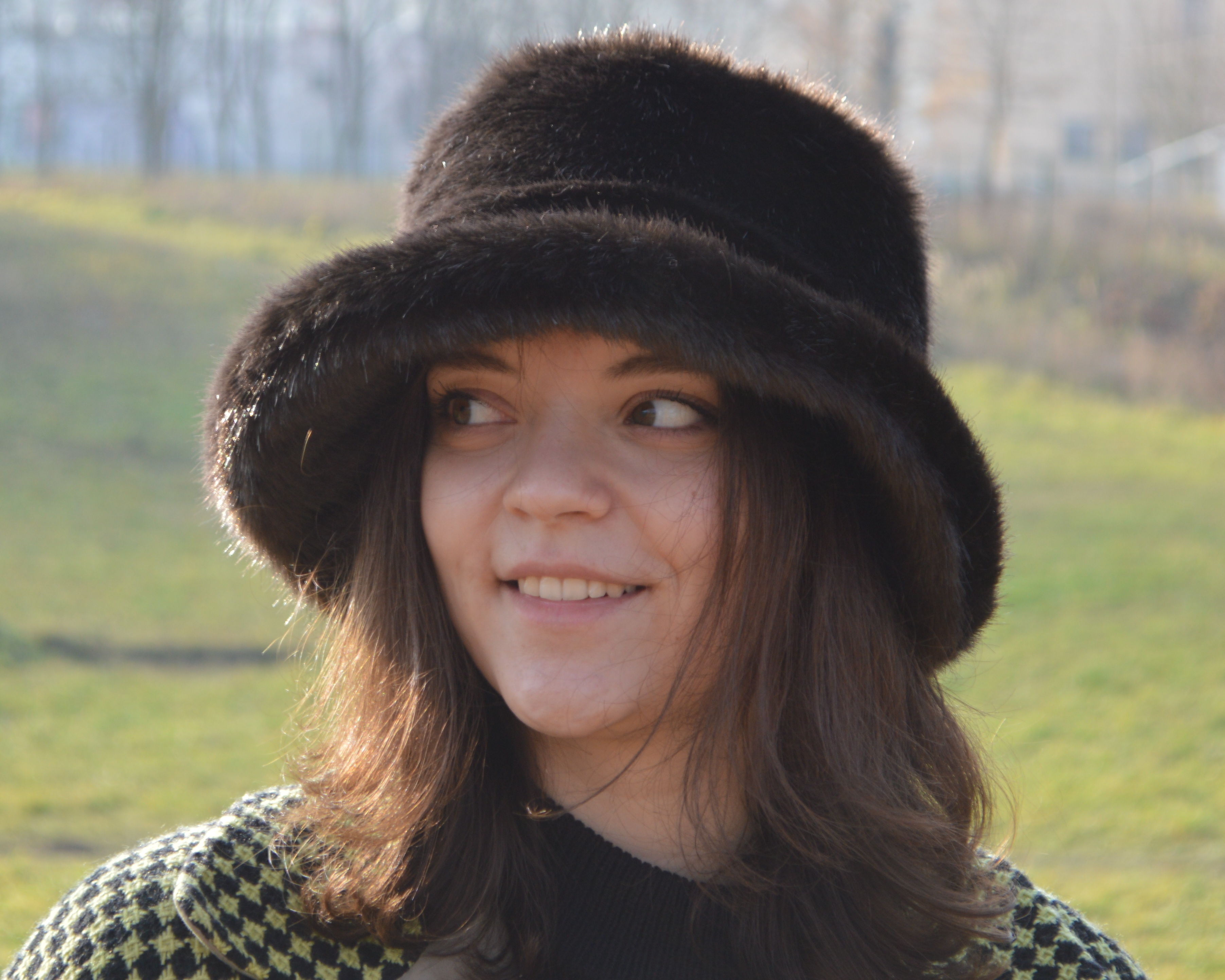 Mink hat made of faux fur. Fashion fluffy hat for women. Cut Inspire