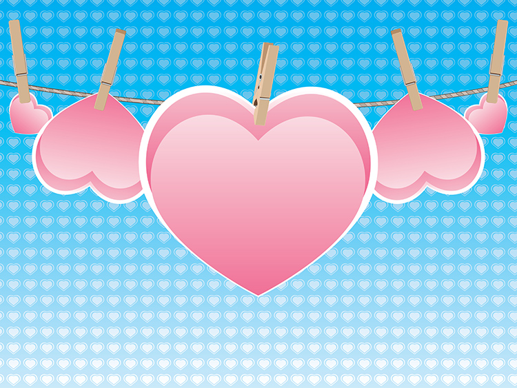 Colorful heart on a rope with wooden pegs | Inspire Uplift