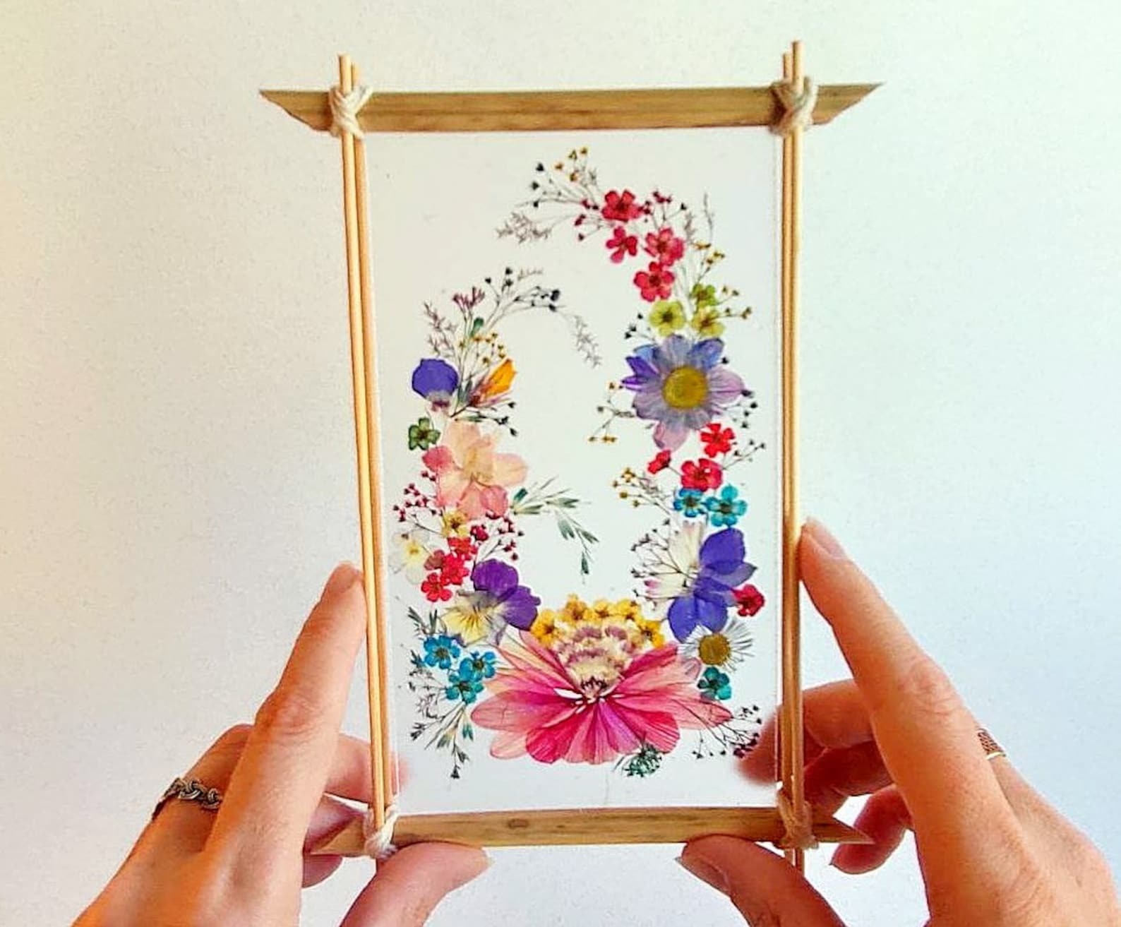 Pressed flower frame Dried flower wall art in floating frame | Inspire ...