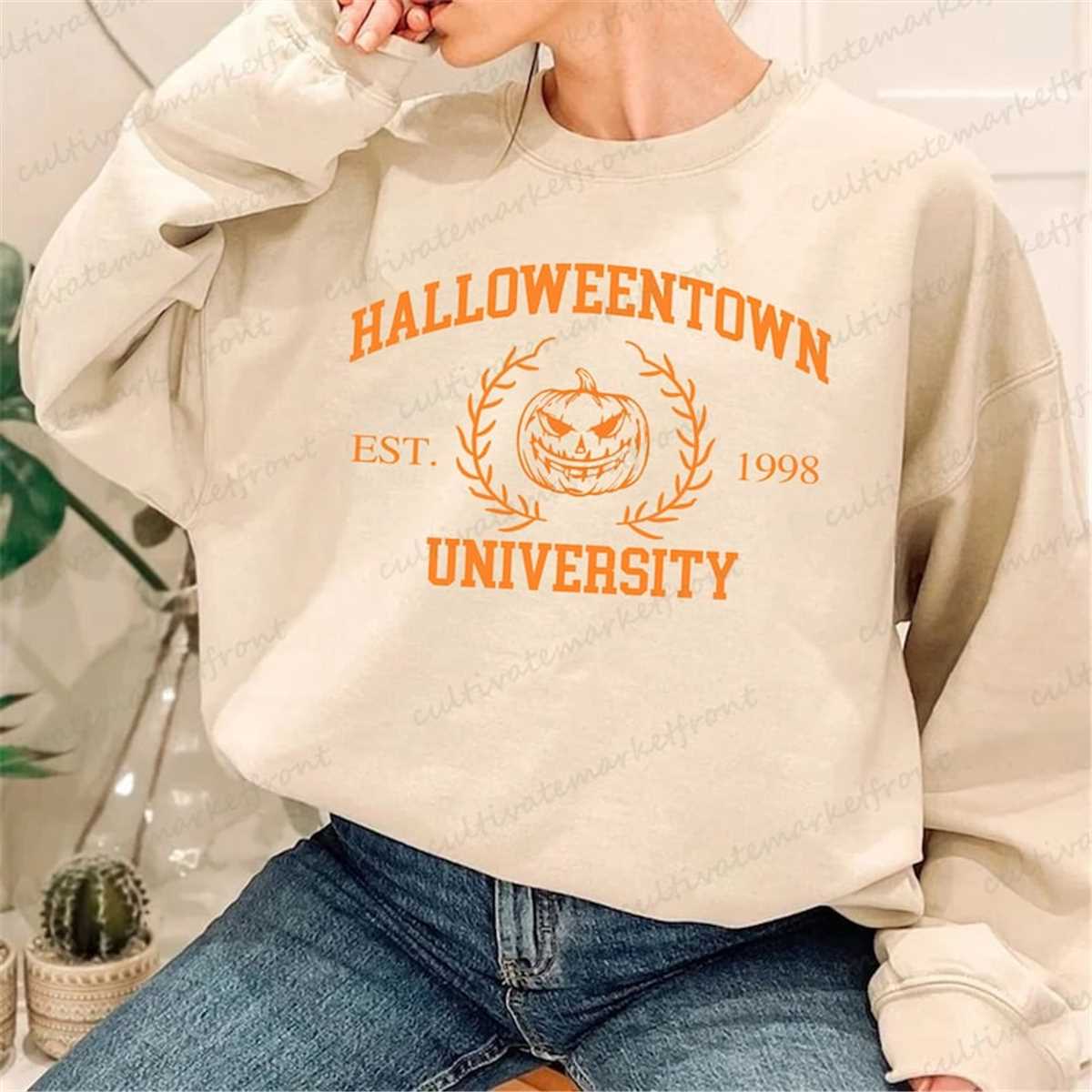 Sweatshirt Halloween Town University EST 1998 - Marque PINEHART, Taille XS, Unisexe Adulte - Neuf Avec étiquettes