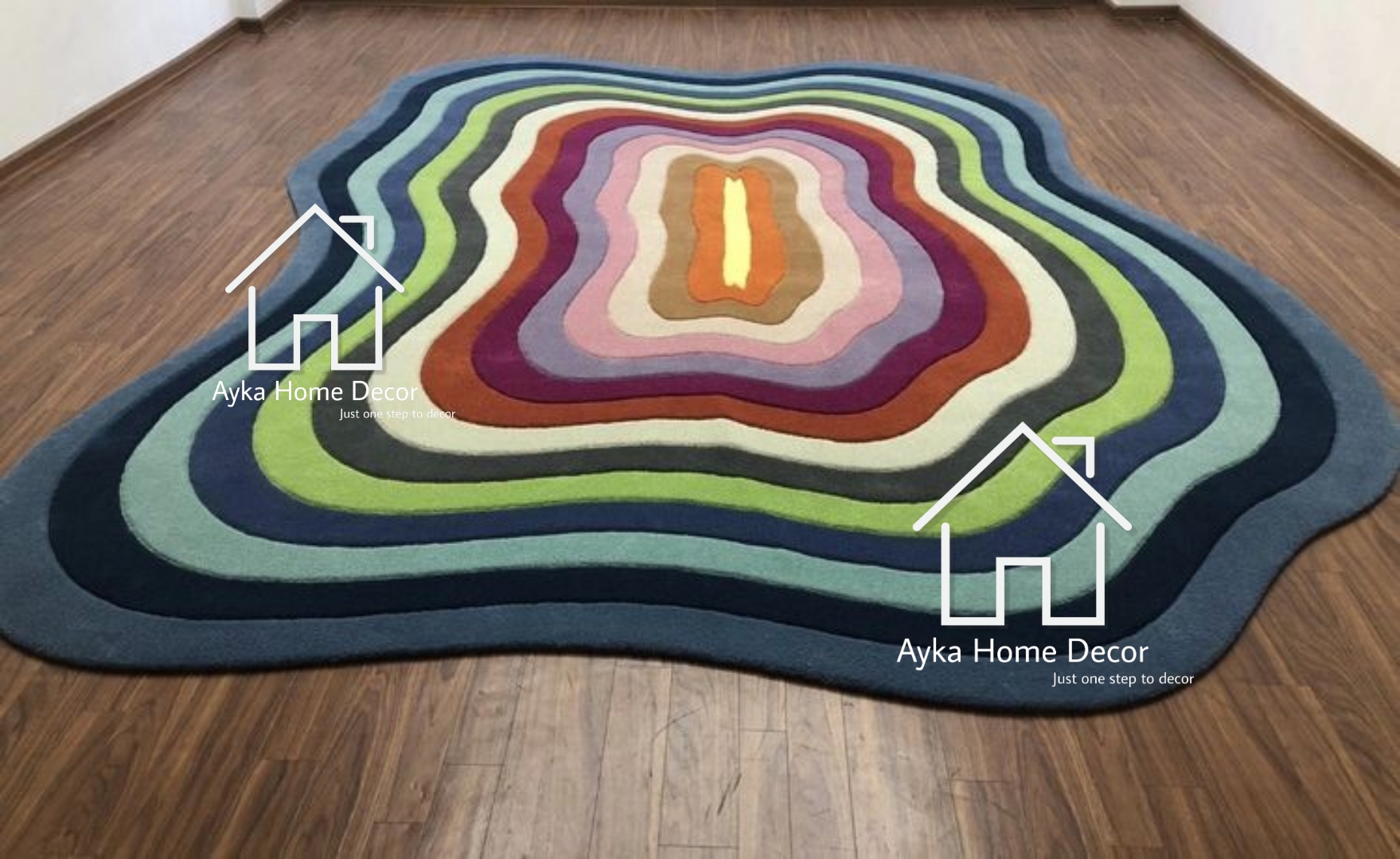 Ayka Floral Irregular hand tufted Round woolen Rug handmade - Inspire ...