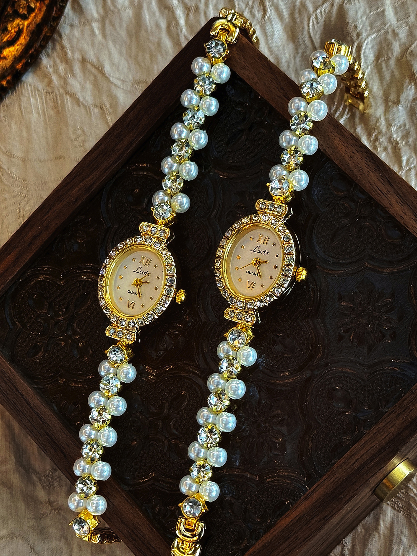 Luxury Women's Pearl Watch with Oval Mother of Pearl Dial & Rhinestone Bracelet