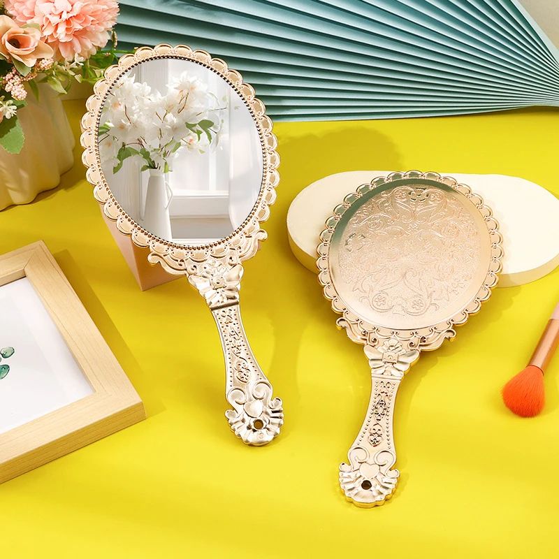 Rose Gold Vintage Handheld Makeup Mirror – Elegant Oval Compact Vanity Mirror for Travel Makeup Salon Beauty and Groomin
